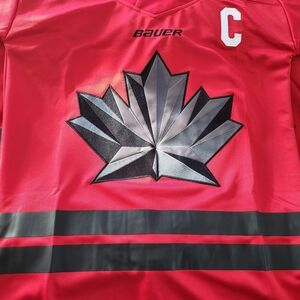 Bauer Bright Pink Hockey Jersey with Metallic Silver Maple Logo